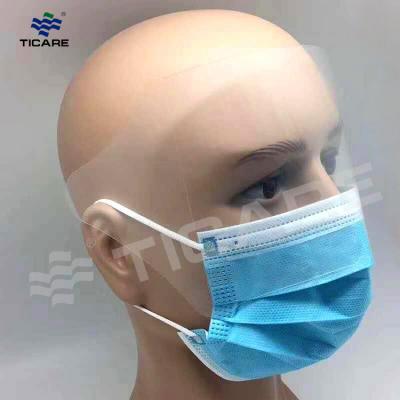 Medical disposable face mask with clear plastic eye shield eye